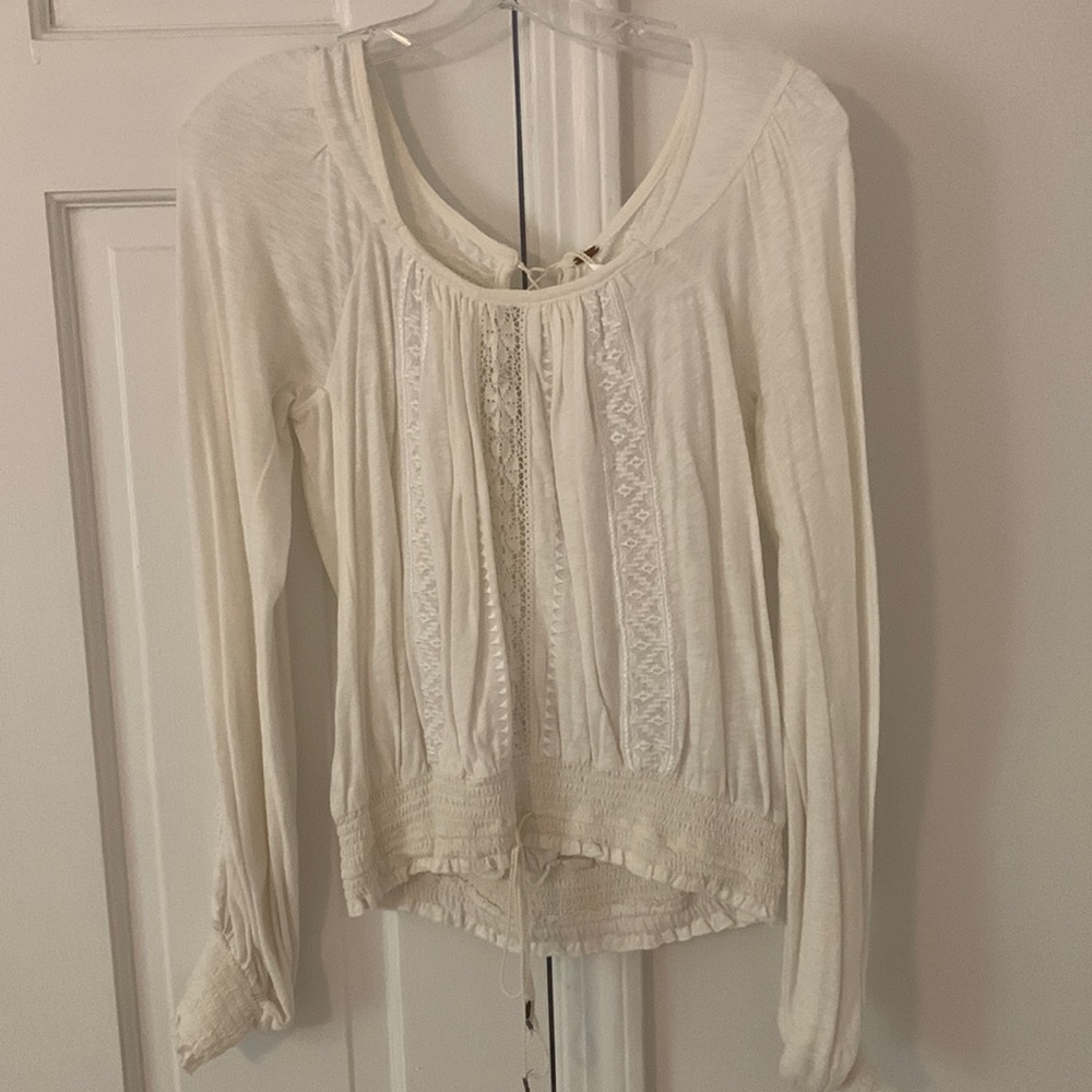 Free People XS long sleeve top. Like new condition- only worn once.